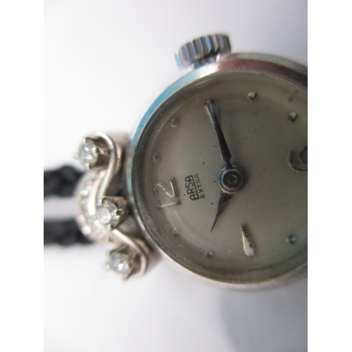 158 - A vintage ladies cocktail watch, the case marked 750 for white gold with diamond set shoulders, the ... 