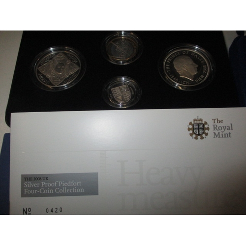 227 - A parcel of Royal mint special collectors coins, silver of various grades 925, 958 and 999, in prese... 