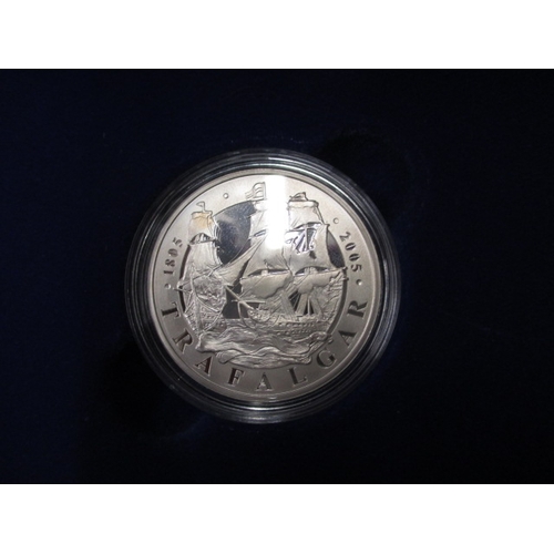 227 - A parcel of Royal mint special collectors coins, silver of various grades 925, 958 and 999, in prese... 