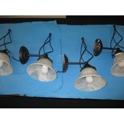 4 wall lights with marbleised glass shades, pre-owned and require an electrician to install