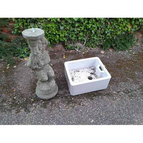 A porcelain butler sink and a bird bath pedestal, approx size of sink 44cm x 38cm x 20cm depth, approx height of bird bath pedestal 70cm