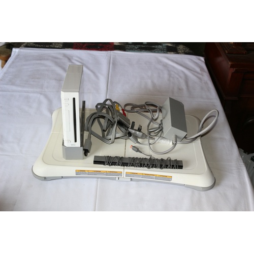 50 - Wii Console with Wires along with Wii Fit Board