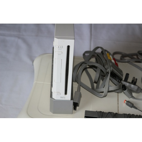 50 - Wii Console with Wires along with Wii Fit Board