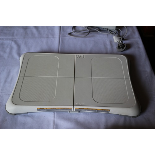 50 - Wii Console with Wires along with Wii Fit Board