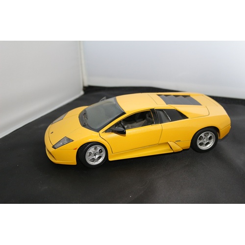 67 - 1:18 Die Cast Scale Model by Maisto of the Iconic Lamborghini Murchielago in Yellow.