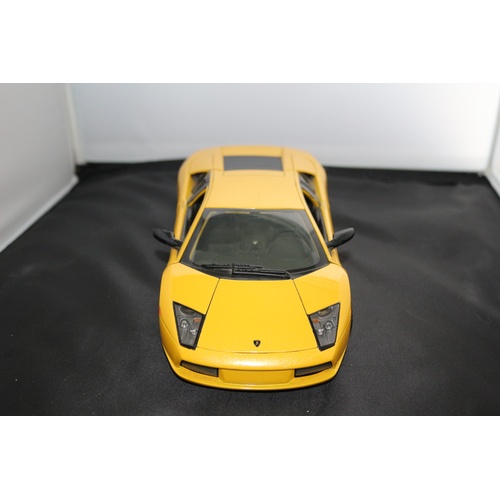 67 - 1:18 Die Cast Scale Model by Maisto of the Iconic Lamborghini Murchielago in Yellow.