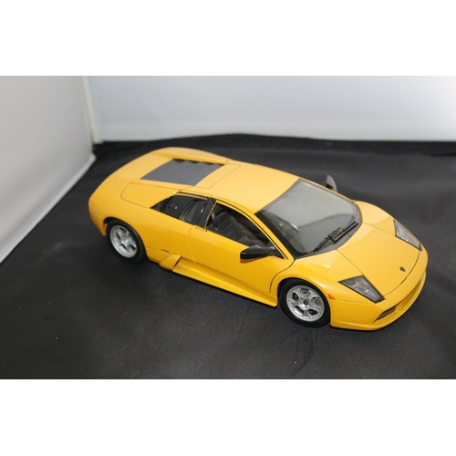 67 - 1:18 Die Cast Scale Model by Maisto of the Iconic Lamborghini Murchielago in Yellow.