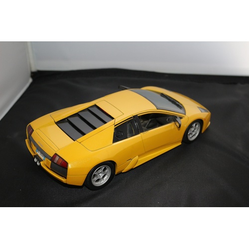 67 - 1:18 Die Cast Scale Model by Maisto of the Iconic Lamborghini Murchielago in Yellow.