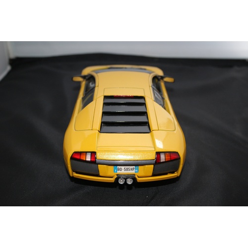 67 - 1:18 Die Cast Scale Model by Maisto of the Iconic Lamborghini Murchielago in Yellow.