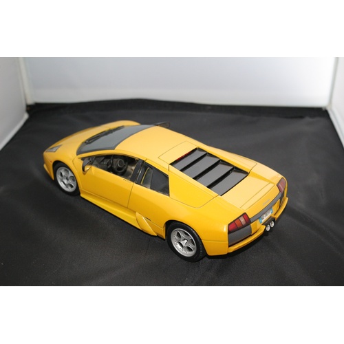 67 - 1:18 Die Cast Scale Model by Maisto of the Iconic Lamborghini Murchielago in Yellow.