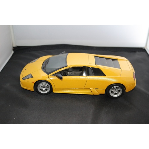 67 - 1:18 Die Cast Scale Model by Maisto of the Iconic Lamborghini Murchielago in Yellow.