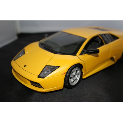 67 - 1:18 Die Cast Scale Model by Maisto of the Iconic Lamborghini Murchielago in Yellow.