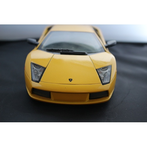 67 - 1:18 Die Cast Scale Model by Maisto of the Iconic Lamborghini Murchielago in Yellow.