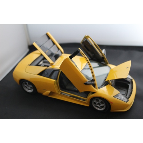 67 - 1:18 Die Cast Scale Model by Maisto of the Iconic Lamborghini Murchielago in Yellow.