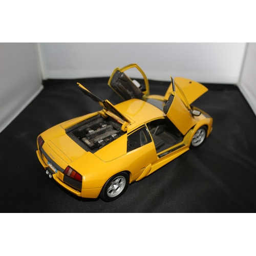 67 - 1:18 Die Cast Scale Model by Maisto of the Iconic Lamborghini Murchielago in Yellow.