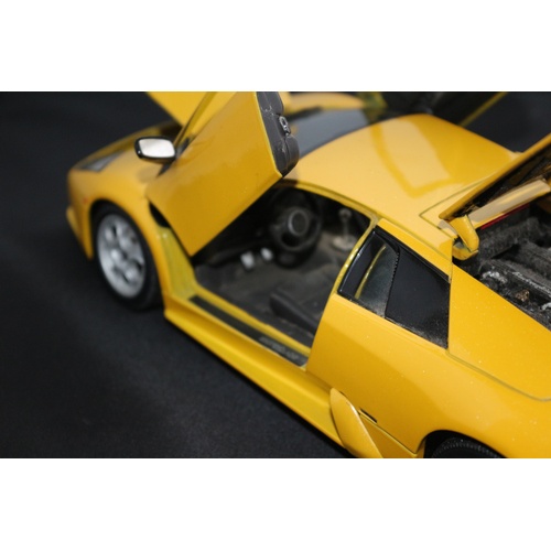 67 - 1:18 Die Cast Scale Model by Maisto of the Iconic Lamborghini Murchielago in Yellow.