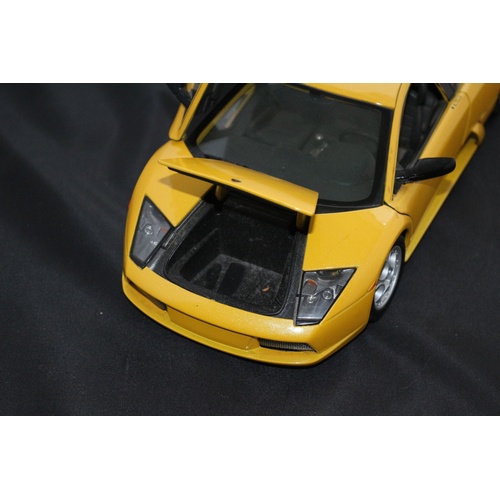 67 - 1:18 Die Cast Scale Model by Maisto of the Iconic Lamborghini Murchielago in Yellow.