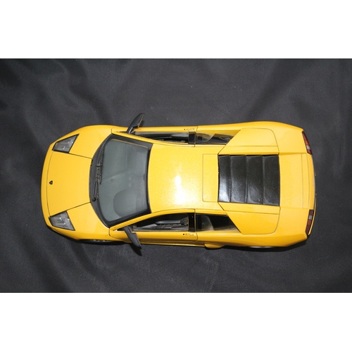 67 - 1:18 Die Cast Scale Model by Maisto of the Iconic Lamborghini Murchielago in Yellow.