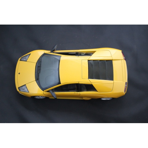 67 - 1:18 Die Cast Scale Model by Maisto of the Iconic Lamborghini Murchielago in Yellow.