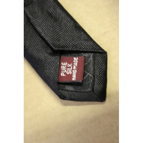 143 - Collection of Like New and New 9 Quality Ties from Well Known Outlets