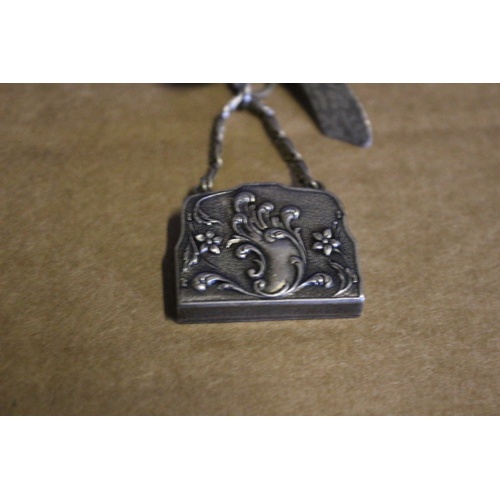 46 - Very Ornate Silver Coloured Metal - Deco Style - Bow with Hanging Handbag Brooch. The Bag Opens