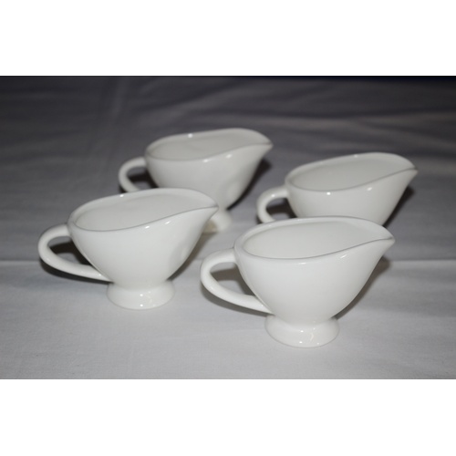 5 - Collection of 4 Individual Sauce Boat Serving Jugs