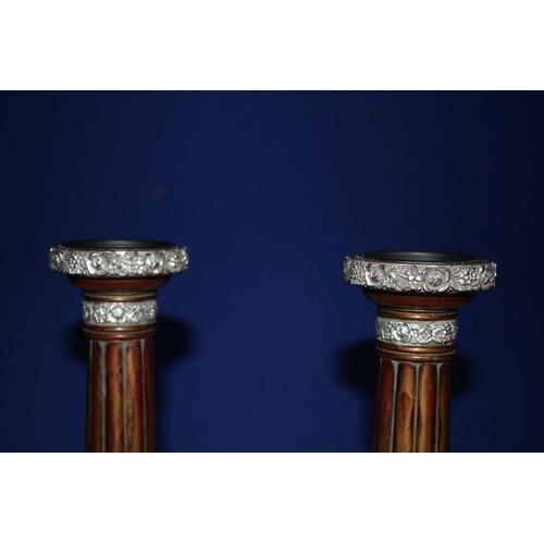 200 - Pair of Moulded Candlesticks