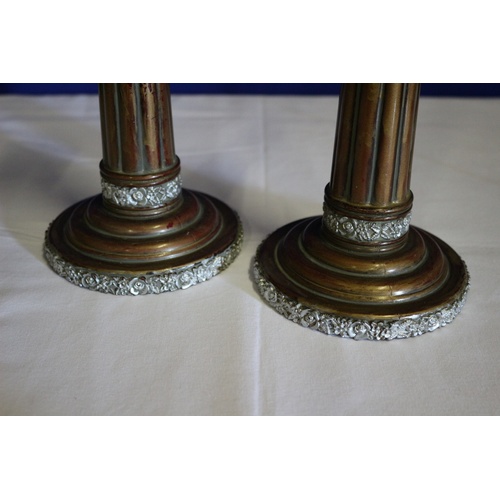 200 - Pair of Moulded Candlesticks