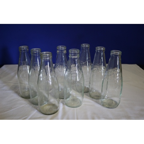 204 - Collection of 8 Vintage Glass Milk Bottles