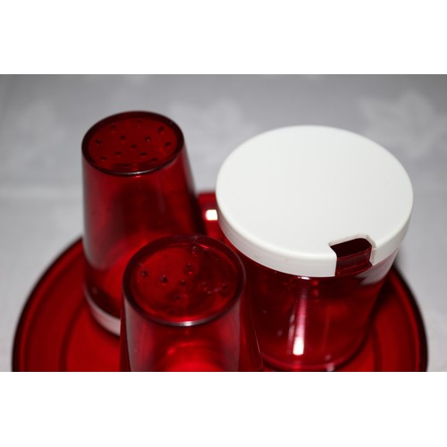 21 - Vintage Deep Red Plastic Condiment Set on Small Circular Stand