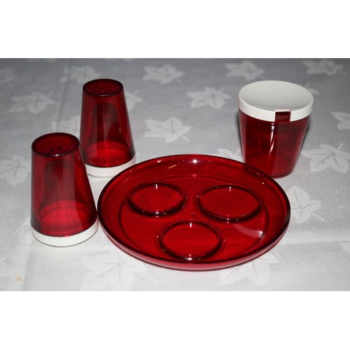 21 - Vintage Deep Red Plastic Condiment Set on Small Circular Stand