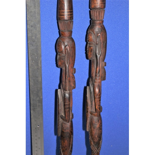 187 - Pair of African Hard Wood, Hand Carved Items in the Design of  Warriors. Both Have Copper Inlay