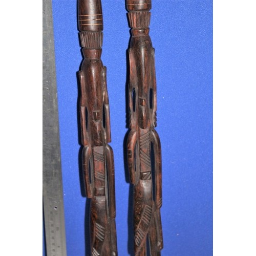 187 - Pair of African Hard Wood, Hand Carved Items in the Design of  Warriors. Both Have Copper Inlay