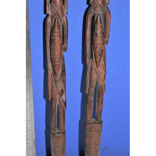 187 - Pair of African Hard Wood, Hand Carved Items in the Design of  Warriors. Both Have Copper Inlay