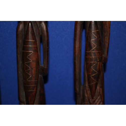 187 - Pair of African Hard Wood, Hand Carved Items in the Design of  Warriors. Both Have Copper Inlay