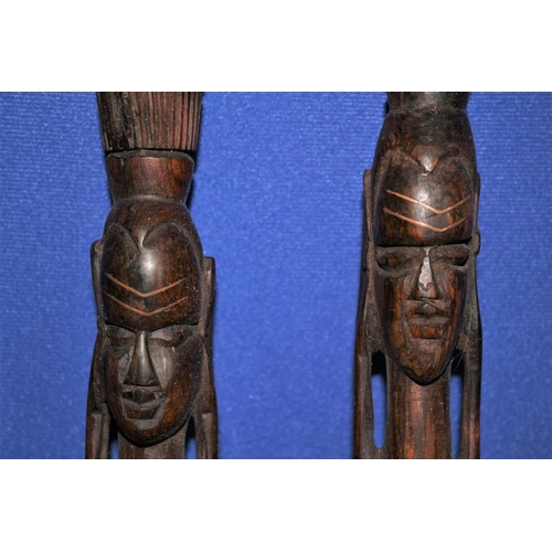 187 - Pair of African Hard Wood, Hand Carved Items in the Design of  Warriors. Both Have Copper Inlay