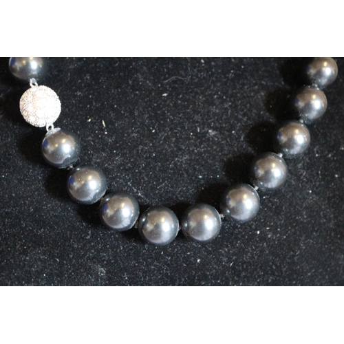 2 - Black Quartz Beads with White Metal Patterned Bead