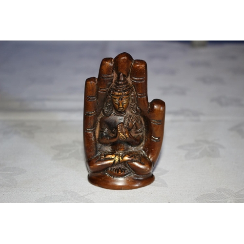 21 - Bronze Seated Buddha in Palm of a Hand