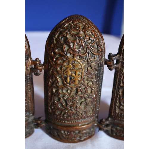 22 - Bronze Triple Oriental Figures encased in a Decorative Fold Out Design