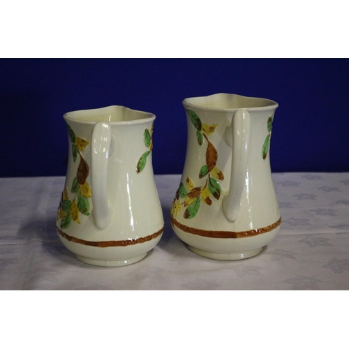 221 - Pair of Decorative Vintage Jugs with Raised Floral Design