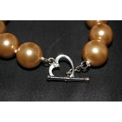 239 - Faux Pearl Bracelet with Silver Marked Heart and Bar Clasp