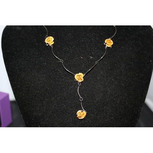 241 - Decorative Yellow Metal Rose Necklace