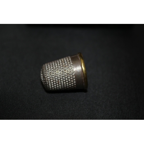 247 - Believed to be Brass Rimmed Vintage Thimble