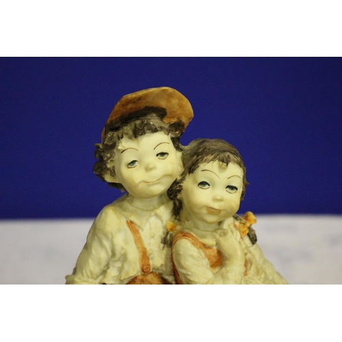 308 - Vintage Pottery Piece of two Children Seated on a Bench