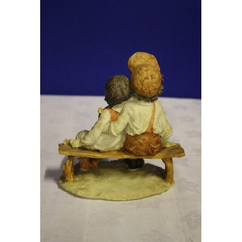 308 - Vintage Pottery Piece of two Children Seated on a Bench