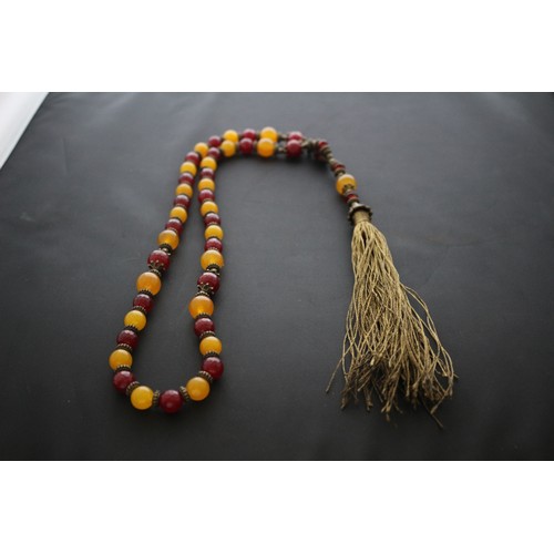 425 - A Buddhist Tassel Bead Necklace