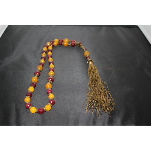 425 - A Buddhist Tassel Bead Necklace