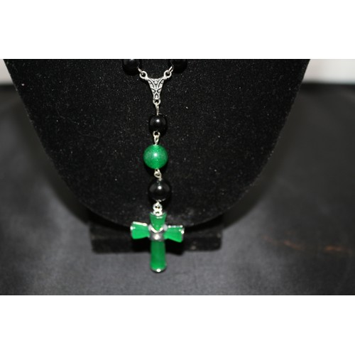 427 - A Green and Black Jade Cross Pendant Necklace