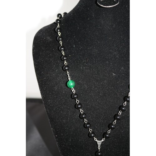 427 - A Green and Black Jade Cross Pendant Necklace