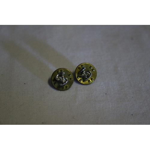 477 - Small Collection Comprising of a Pair of Gold Plated Earrings, Dollar Sign Shirt Pins and a Single C... 